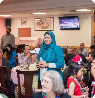 Guests at a community fundraiser dinner