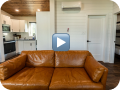 Living room still from a walkthrough video
